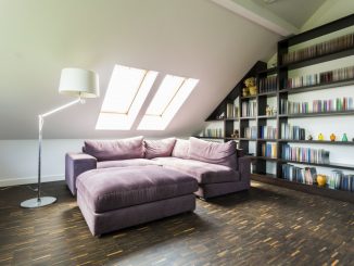 a purple sofa in the attic