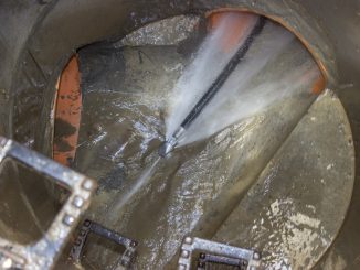Hydro jetting a sewer